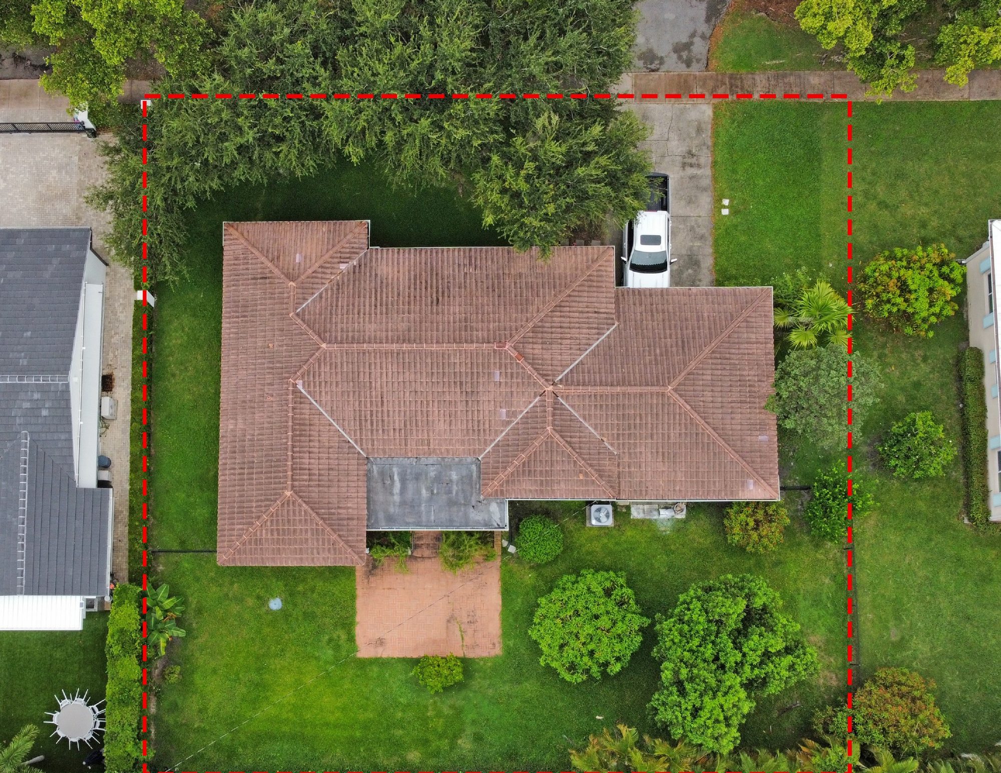 Aerial view of the rear yard and lot boundary at 733 Tiziano Avenue